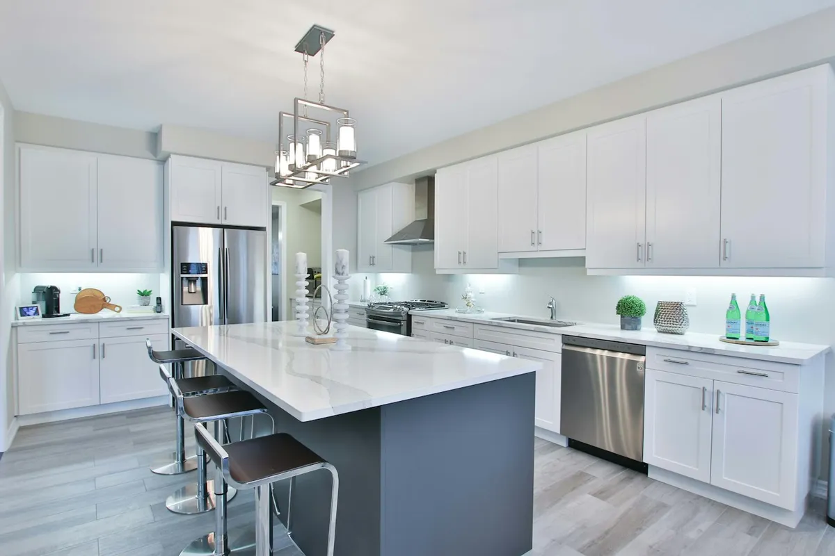 Modern kitchen with island bench and white cabinetry