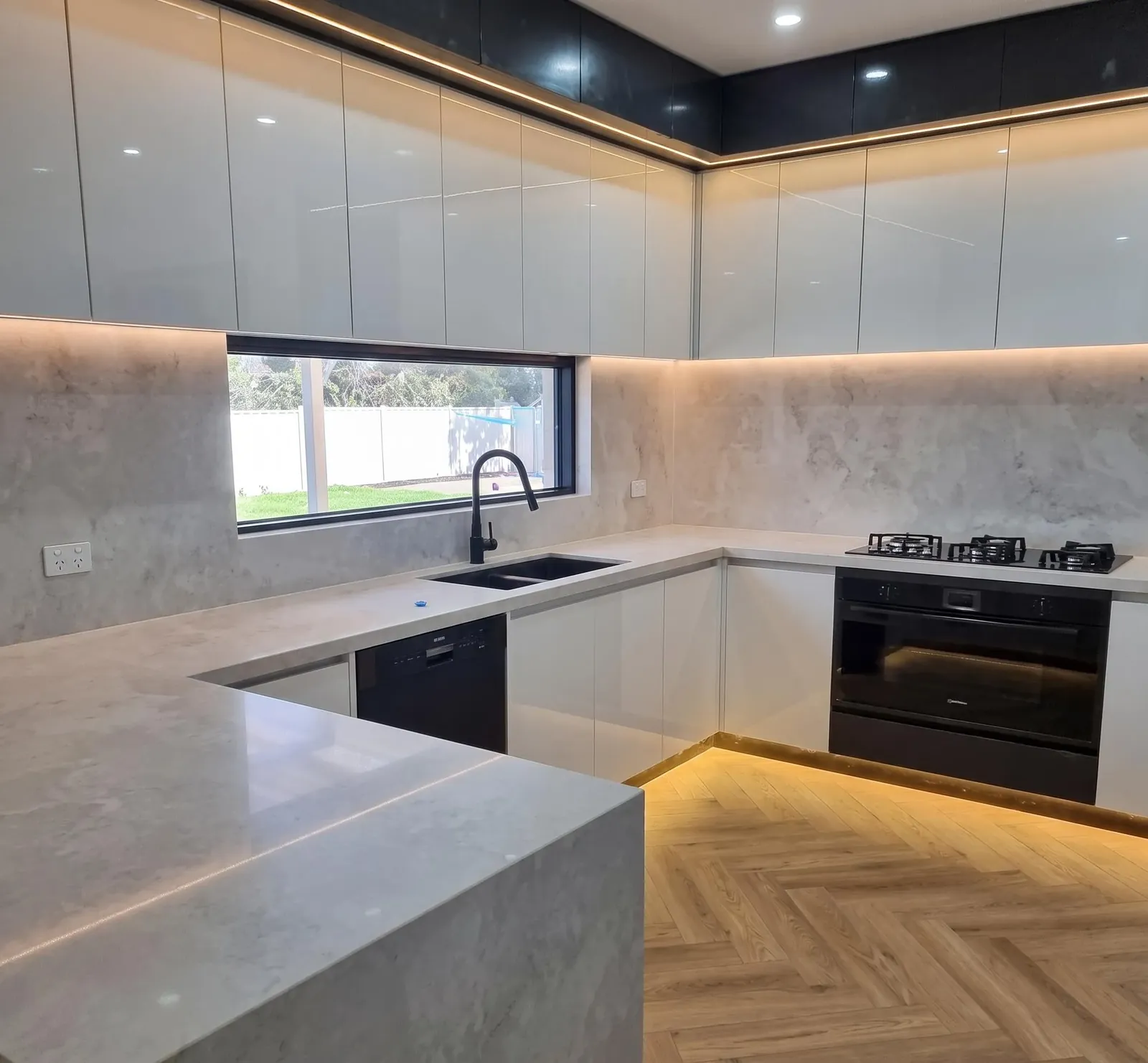 U-shape stone kitchen installed by Melbourne Marble Designs